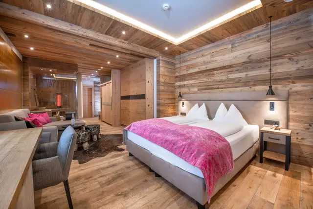 Box spring bed, couch, and sauna with infrared cabin