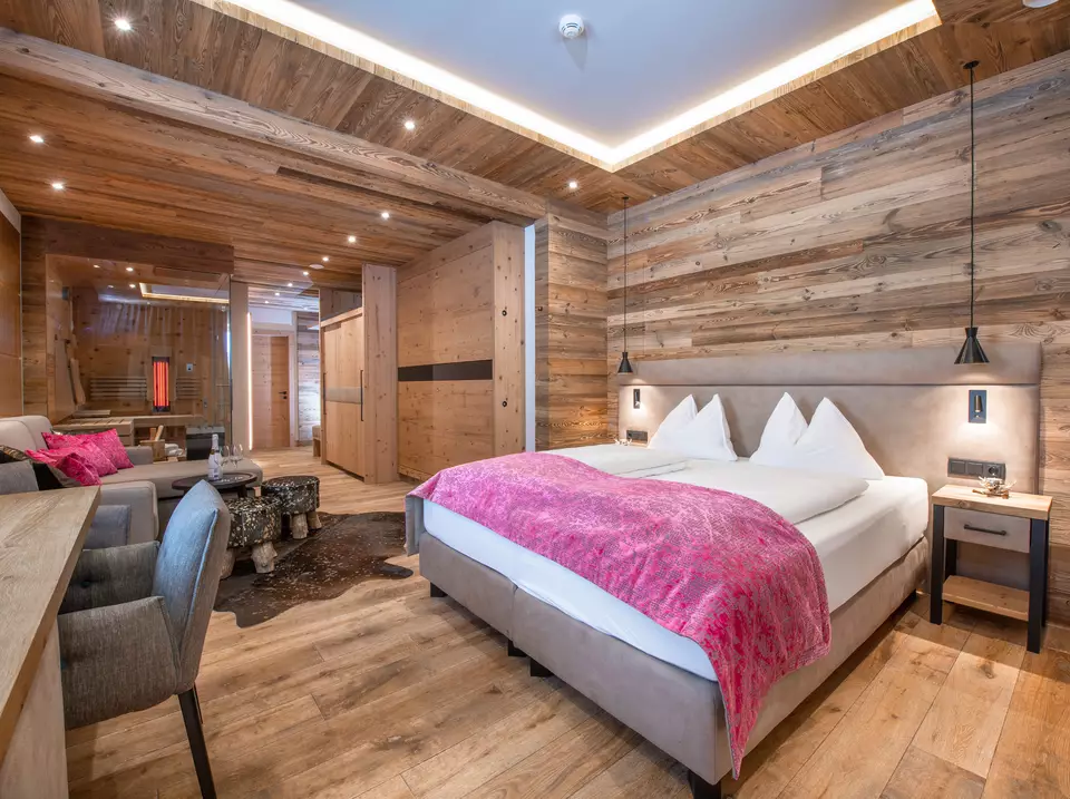 Box spring bed, couch, and sauna with infrared cabin