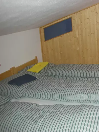 Drei Betten in einem Raum