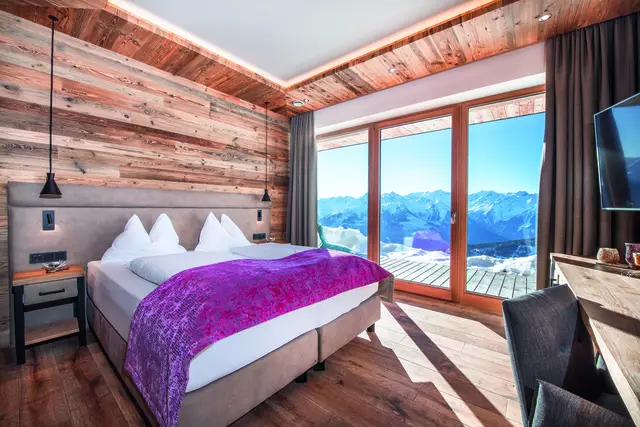 Box spring bed and balcony view