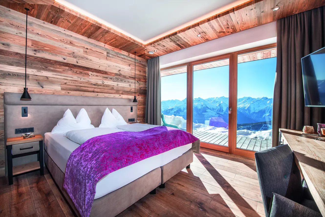 Box spring bed and balcony view